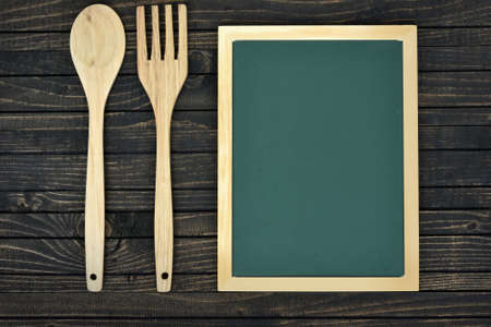 Fork and spoon on wooden tableの写真素材