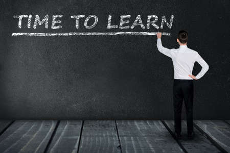Time to learn text write on black boardの写真素材