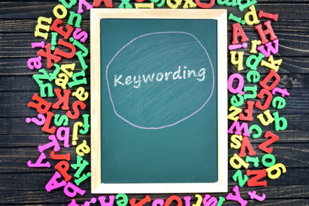 Keywording text on school board and magnetic lettersの写真素材