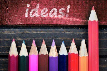 Ideas text and group of pencil on wooden tableの写真素材