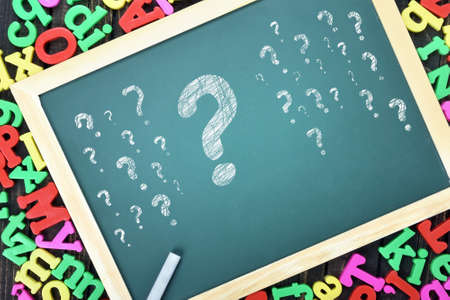 Question marks on school board and magnetic lettersの写真素材