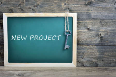 New Project text on school board and old keyの写真素材