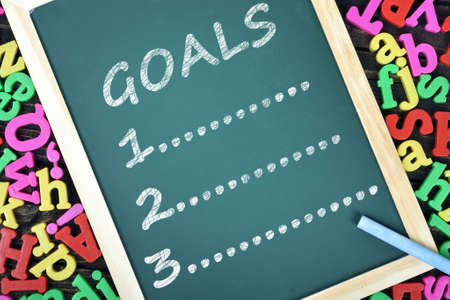 Goals list on school board and magnetic lettersの写真素材