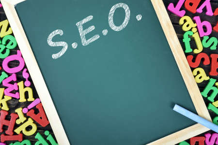 S.E.O text on school board and magnetic lettersの写真素材