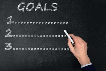 Goals text write on black boardの写真素材
