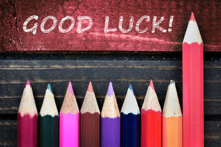 Good Luck text and group of pencil on wooden tableの写真素材