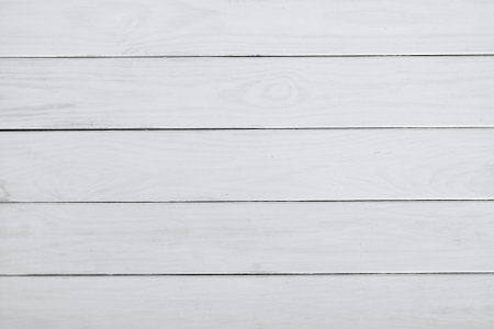 Empty white wooden table backgroundの写真素材