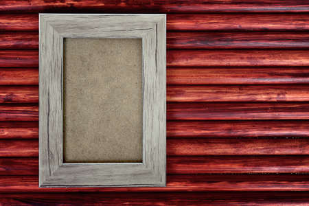 Photo frame on wooden tableの写真素材