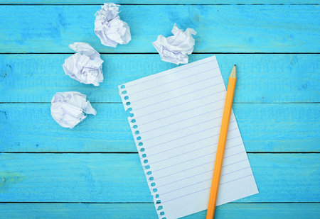Empty notepad on wooden table