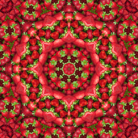 Red fruit background.  Fresh ripe red strawberry with green leaves, close-up, full frame, macroの写真素材