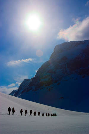 Group of climbers on expedition. Winterの写真素材