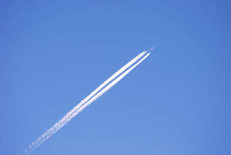 Airplane in blue sky