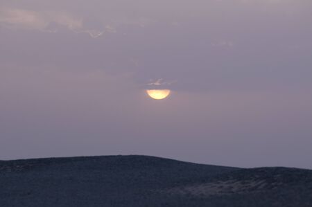 Closeup of a sun in the cloudsの写真素材