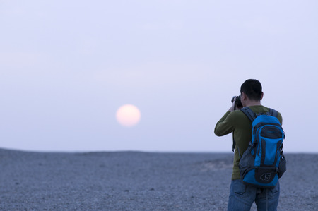 Closeup of a man taking picturesの写真素材