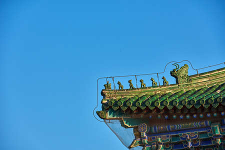 Figurine on the roofの写真素材