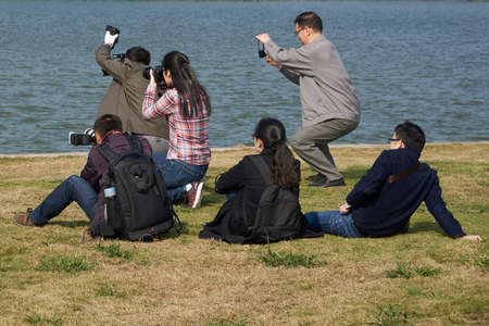 Photographers taking a scenic shotのeditorial素材