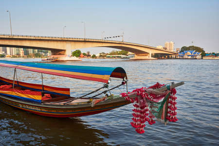 Flowers tied to the bow of the boat in Thailandのeditorial素材