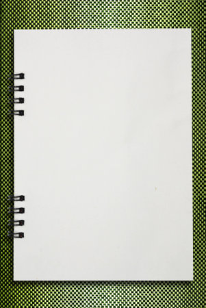 Paper notebook on leather pattern background for text