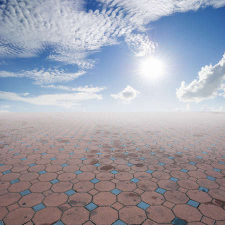 Brick floor and Clouds sky for backgroundの写真素材