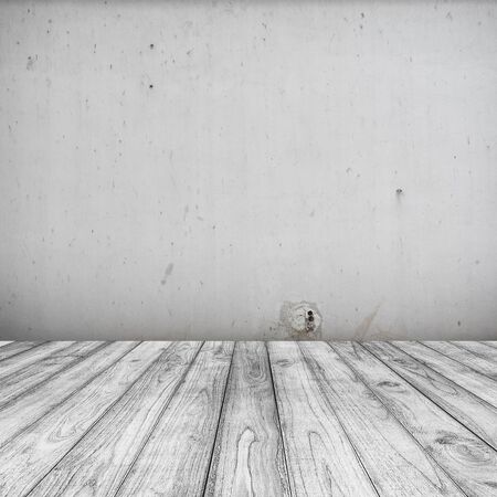 Concrete walls and wood floor for text and backgroundの写真素材