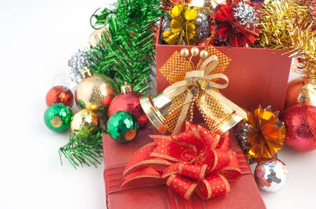 Christmas and New year  gift box with decorations and color ball isolated on white background