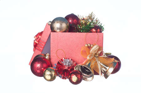 Christmas and Newyear gift box with decorations and color ball isolated on white backgroundの写真素材
