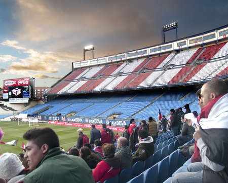 MADRID; SPAIN - FEBRUARY 6: Friendly football match Chile against Egypt on February 6, 2013 at Atletico de Madrid Stadium, Spain. Public section and empty section, score 0-0のeditorial素材