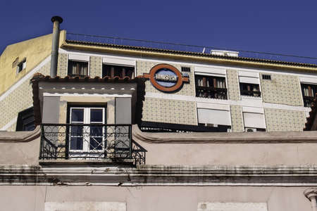 Typical portuguese houses in Lisbon, at Terreiro do Paço, headquarters of the transportation company Transfesaのeditorial素材