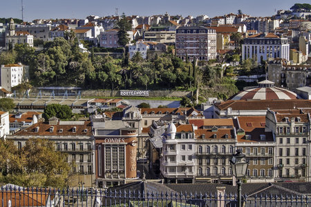 General view of Lisbon downtown and hills from Bairro Alto district, with the ancient cinema Condes, today the Hard Rock Cafeのeditorial素材