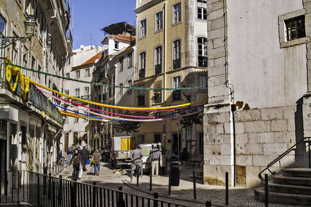 Traditional street at popular Alfama district of Lisbonのeditorial素材