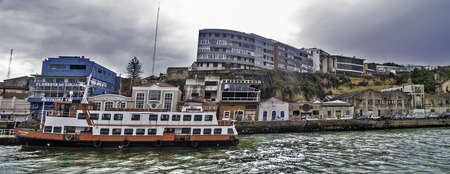 Almada - Portugal, November 2012. Quay of Almada with a ferry of Transtejo Company (connects to Lisbon). Almada is a town in front of Lisbon, at the other side of Tagus Estuary. Founded in 1190, has a population of 100,000.のeditorial素材
