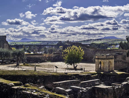 Mérida, November 2012. Arab ruins inside a fortress, in Mérida, capital of Extremadura region in Spain. IX century  Archeological site UNESCO World Heritage Site. A person visit the site near a cistern building.のeditorial素材