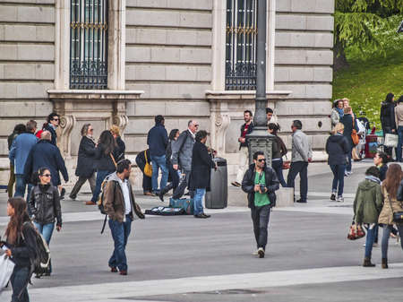 Madrid, May 2012. Royal Palace surroundings. Diversity of people of different nationalities. Tourist scene. Tourism represents 9% of Spain global income. 53 million tourist in 2010.のeditorial素材