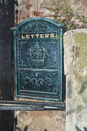 Ancient letters box on metal in a particular houseの写真素材