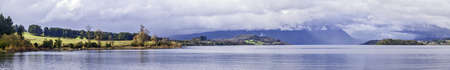 Chilean Patagonian landscape panorama with lake and mountains on winter の写真素材