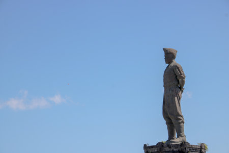 Bali - Indonesia 28 May 2023. Photo of I Gusti Ngurah Rai Statue with clear blue sky background. Indonesian National Hero from Baliのeditorial素材