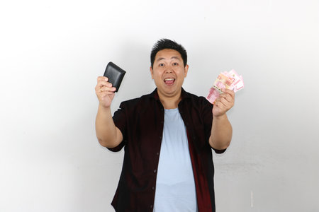 Happy Asian Man Holding Money and Wallet