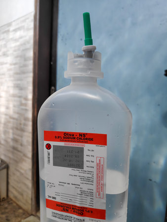 Sterile and nonpyrogenic normal saline solution in a 500 mL plastic bottle from Otsuka Indonesia. Bandung 22 March 2025のeditorial素材