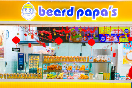 Beard Papas cream puff store front with festive Lunar New Year decorations Bali, Indonesia 26 March...