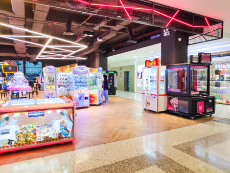People walking around electronic simulator gaming stations at Timezone park, Bandung 14 June 2026