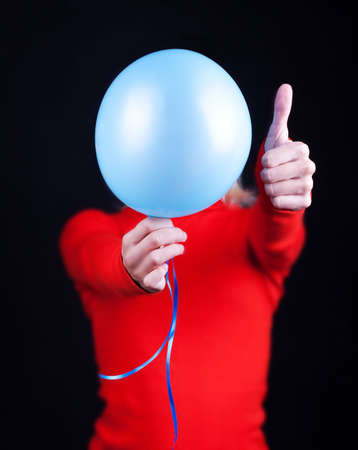 Portrait of a humans body and balloonの写真素材