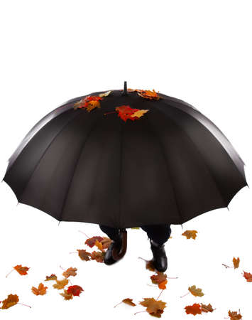 Picture of human hiding under open umbrellaの写真素材