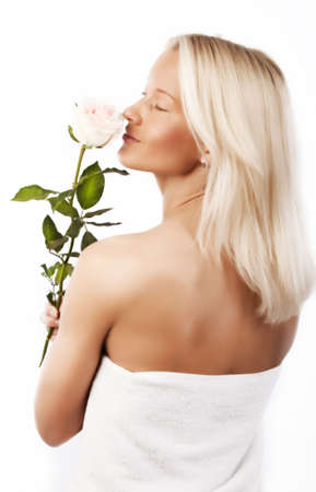 Picture of sexy girl smelling a flowerの写真素材