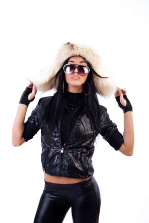 Portrait of glam girl wearing a fur hat and posingの写真素材