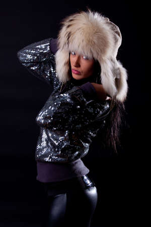 Picture of attractive serious girl wearing fur hatの写真素材