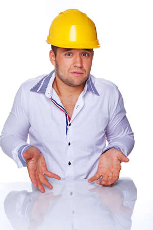 Portrait of handsome engineer posing in studioの写真素材