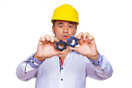 Portrait of worker posing in studio with screwの写真素材