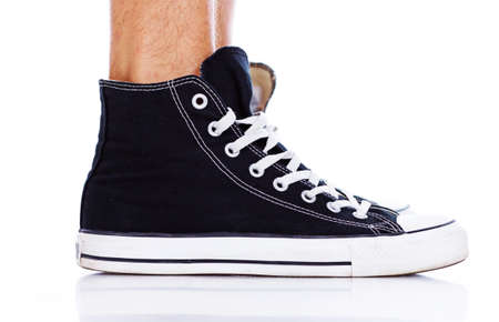 Close portrait of legs wearing bootsの写真素材
