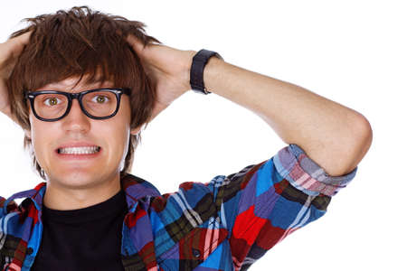 Portrait of crazy student posing in studio in glassesの写真素材