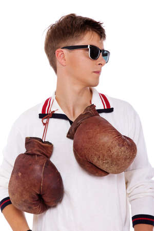 Portrait of sereous man posing in studio with boxing glowesの写真素材